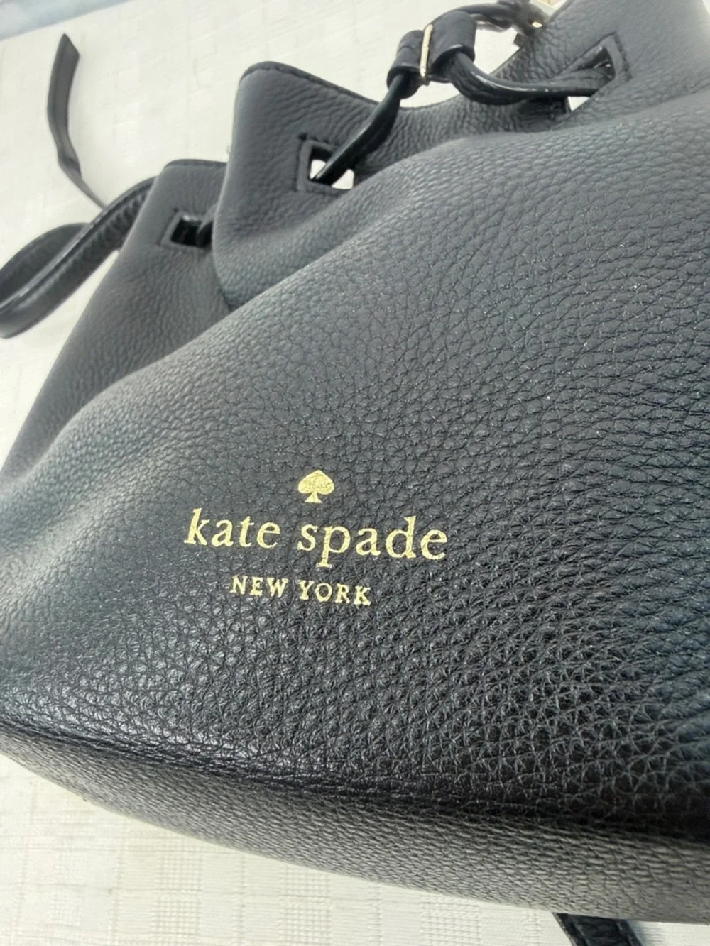 Kate Spade New York drawstring bucket bag, from the Grey Street  Tiny Cooper